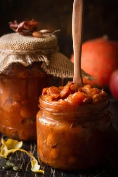 Pumpkin, lemon and apricot kernel jam. Stock Photos