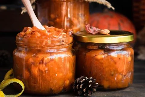 Pumpkin, lemon and apricot kernel jam. Stock Photos