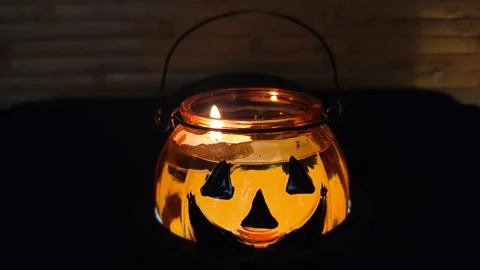 Pumpkin with a light-up face. Halloween. Stock-Footage 319789461