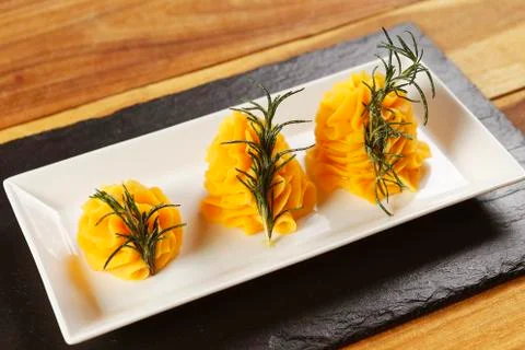 Pumpkin mousse with roasted vegetables, steamed red rice, and baked potatoes  Stock Photos