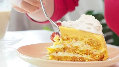 Pumpkin or carrot pie or cake with cream on top 库存影片 154597986