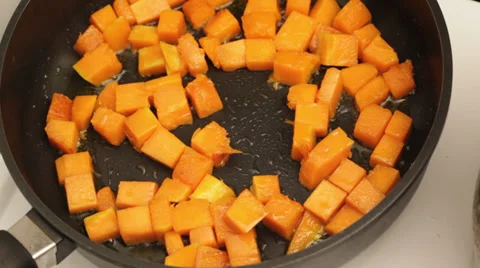 Pumpkin pan frying Stock Footage 35921108
