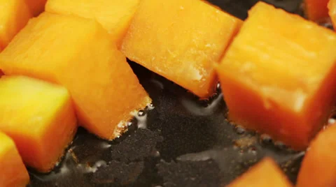 Pumpkin pan frying macro Stock Footage 35921075