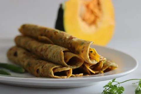 Pumpkin paratha, Indian flat bread made of whole wheat flour, grated pumpkin, Stock Photos
