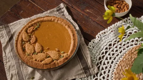 Pumpkin Pie Decorated with Leaf Cookies for Thanksgiving Celebration Stock Footage 341393587