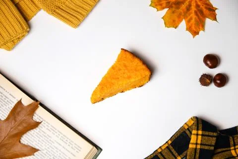 Pumpkin pie flat lay for fall concept, top view. Top view of pumpkin pie with Фото