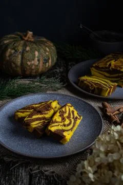 Pumpkin pie on a gray plate Stock Photos