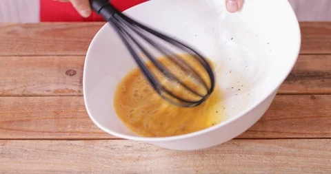 Pumpkin pie making, mixing eggs Stock Footage 96215578