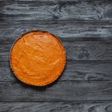 Pumpkin pie on rustic gray background Stock Photos