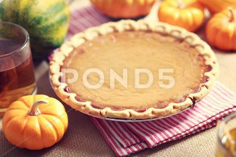 Pumpkin pie with small pumpkins Stock Photos