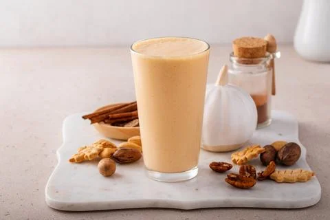 Pumpkin pie smoothie with fall spices and pumpkin puree Stock Photos