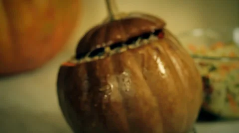 The pumpkin pot full of the hot buckwheat (zoom in) Stock Footage 35162809