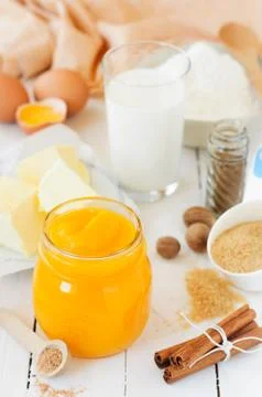 Pumpkin Puree Surrounded with Pumpkin Pie Ingredients Stock Photos