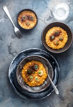 Pumpkin risotto in a table on stone background Stock Photos
