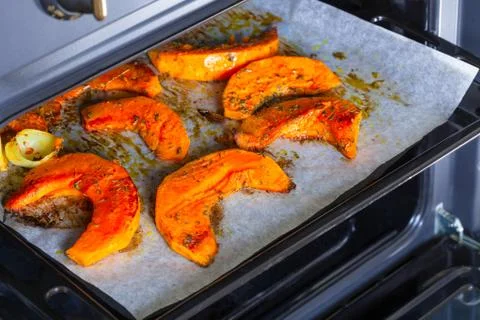 Pumpkin roasted in the oven Stock Photos