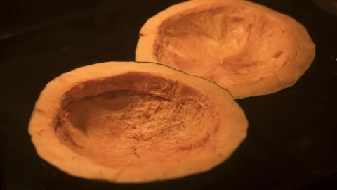 Pumpkin roasting Stock Footage 79720154
