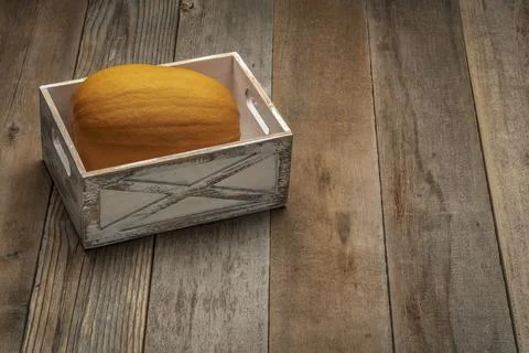 Pumpkin in a rustic storage crate Stock Photos