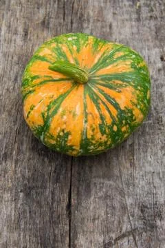 Pumpkin on rustic wooden table Stock Photos
