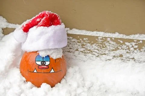 Pumpkin with Santa hat Stock Photos