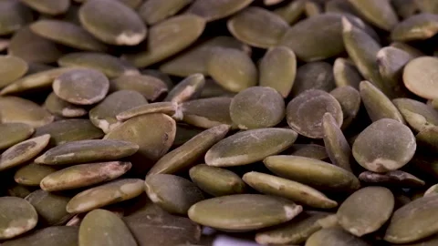 Pumpkin seed kernels close-up Stock Footage 240011144
