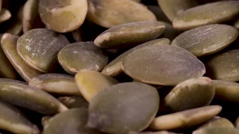 Pumpkin seed kernels close-up Stock Footage 240011181