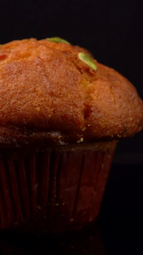 Pumpkin Seed Muffin Rotating Under Studio Lighting Stock Footage 330517440