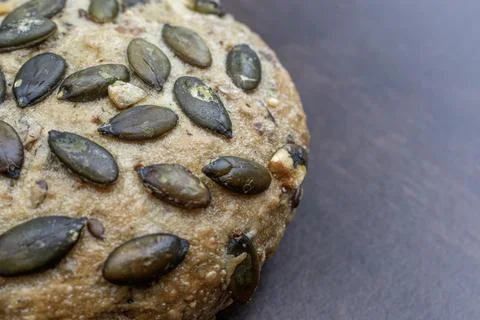Pumpkin seed rolls bread: Nutritious product of rough grinding. Stock Photos