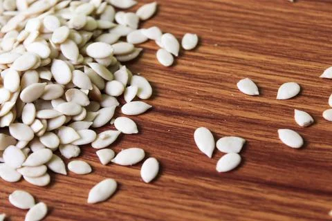 Pumpkin seeds background Stock Photos