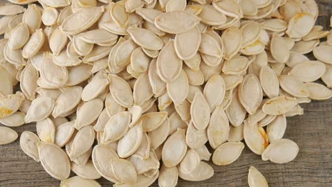 Pumpkin seeds on the table. Stock Footage