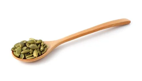 Pumpkin seeds on a white background Stock Photos