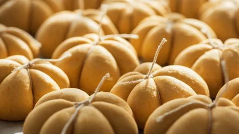 Pumpkin-shaped bread rolls for autumn harvest celebration Stock Photos