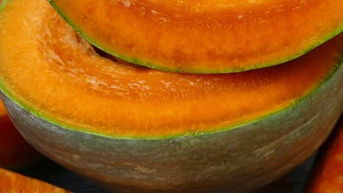Pumpkin slices divided into slices with a knife, 스톡 동영상 101063257