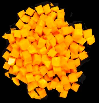 Pumpkin small blocks on black background Stock Photos