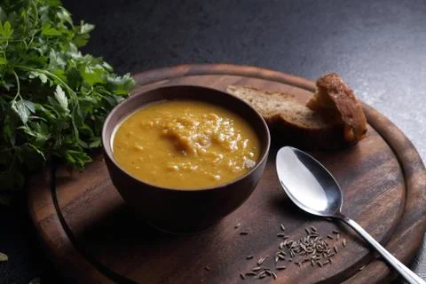 Pumpkin soup and bread Stock Photos