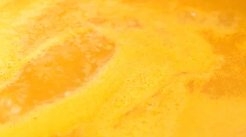 Pumpkin soup boiling - panning right - close up Stock Footage 35853682