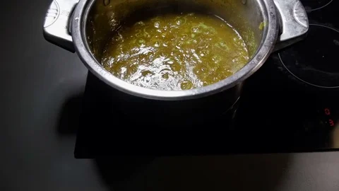 Pumpkin soup boils Stock Footage