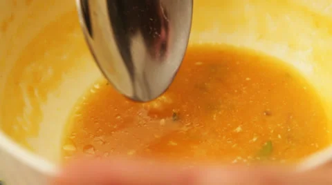 Pumpkin soup eating; close up;  Stock Footage 35920644