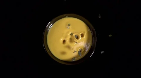 Pumpkin soup, isolated on black Stock Footage 64702802
