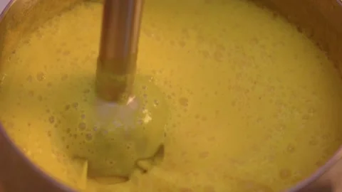 Pumpkin soup preparation, the process of making vegetable cream soup with a Stock Footage 235685755