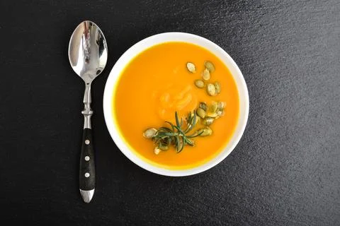 Pumpkin soup with seeds Stock Photos