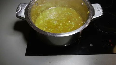 Pumpkin soup on the stove Video stock 76983344