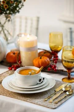 Pumpkin soup on the table 1 Stock Photos