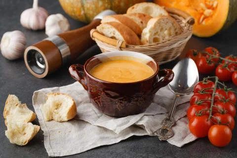 Pumpkin soup on table Stock Photos