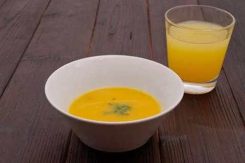 Pumpkin soup on a table Stock Photos