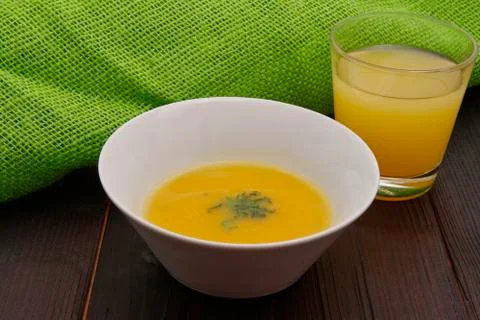 Pumpkin soup on a table Stock Photos