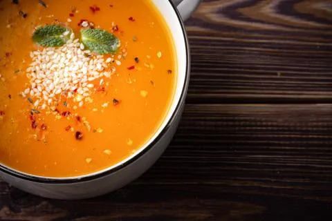 Pumpkin soup on the table Stock Photos