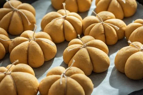 Pumpkin spice bread buns baking for autumn holidays Stock Photos