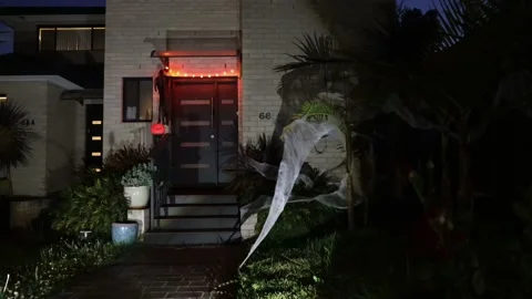 Pumpkin, spiders, web, witch and lights Halloween decoration of a house 4k. Stock Footage 163847901