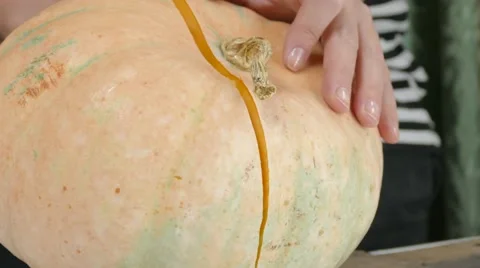 Pumpkin splitting, 4k Stock Footage 60777481