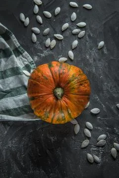 Pumpkin on a stone table Stock Photos
